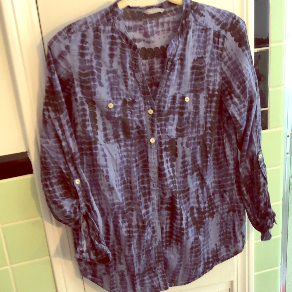 Tie-dyed navy buttoned women’s shirt.